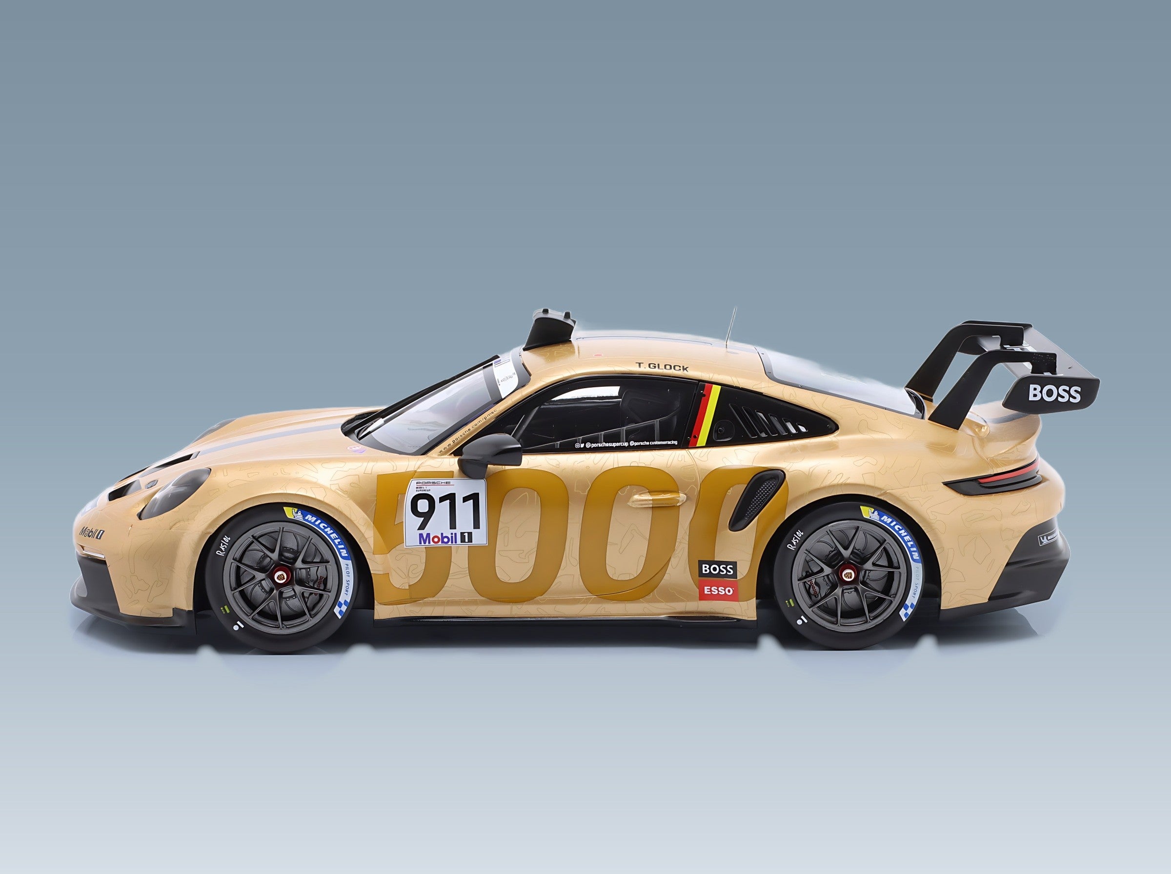 Porsche 911 992 GT3 Cup Porsche Motorsport No. 911 Timo Glock Porsche Supercup Hungaroring 2023 IXO Models 1:18 scale model - side view