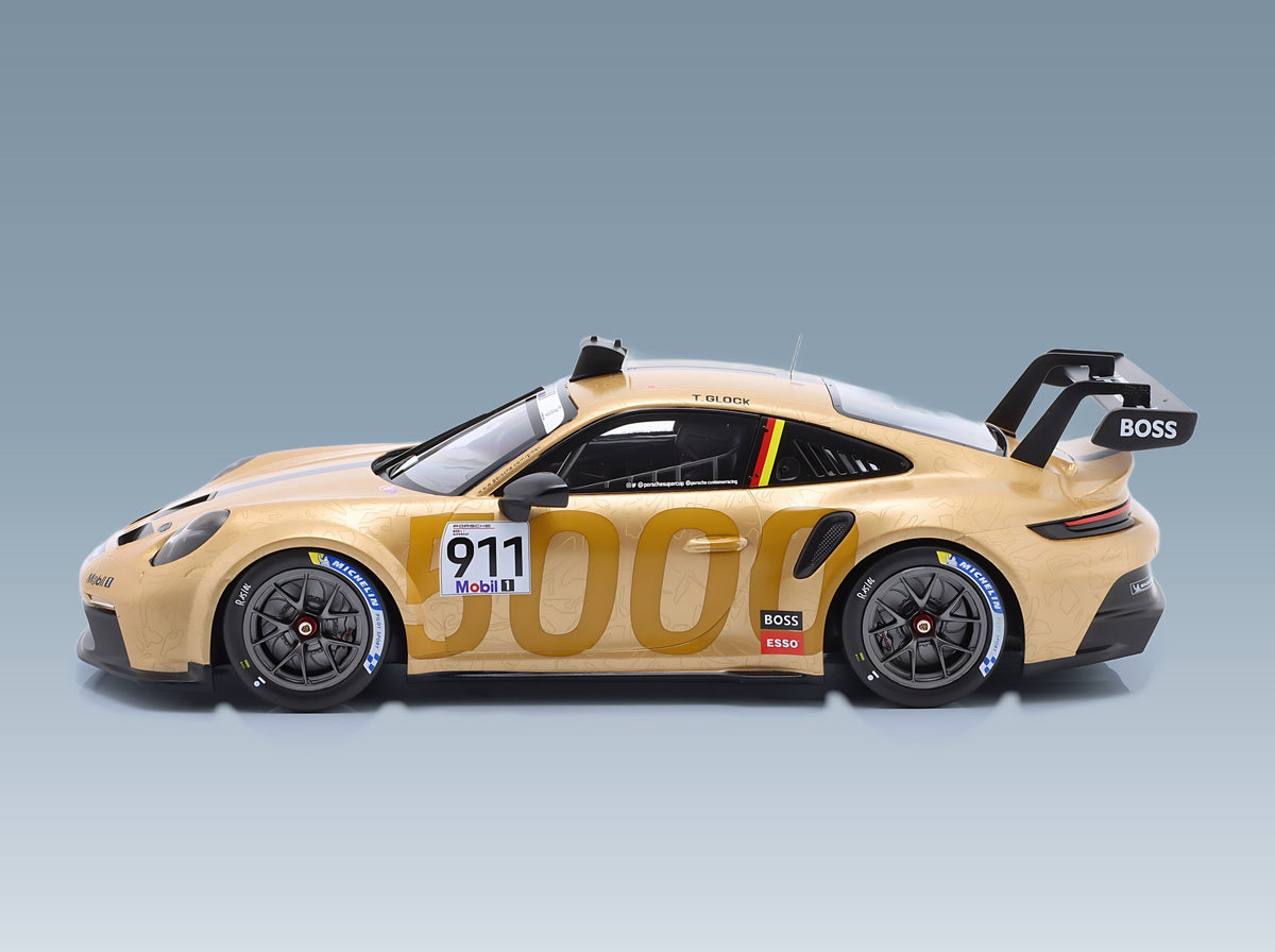 Porsche 911 992 GT3 Cup Porsche Motorsport No. 911 Timo Glock Porsche Supercup Hungaroring 2023 IXO Models 1:18 scale model - side view