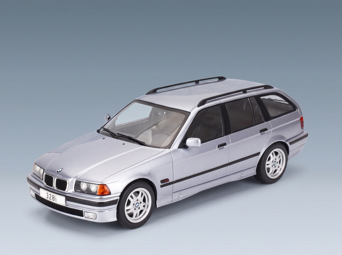 BMW 3 Series 328i Touring Station Wagon 1995 Blue Metallic MCG 1:18 scale model - front three-quarter view