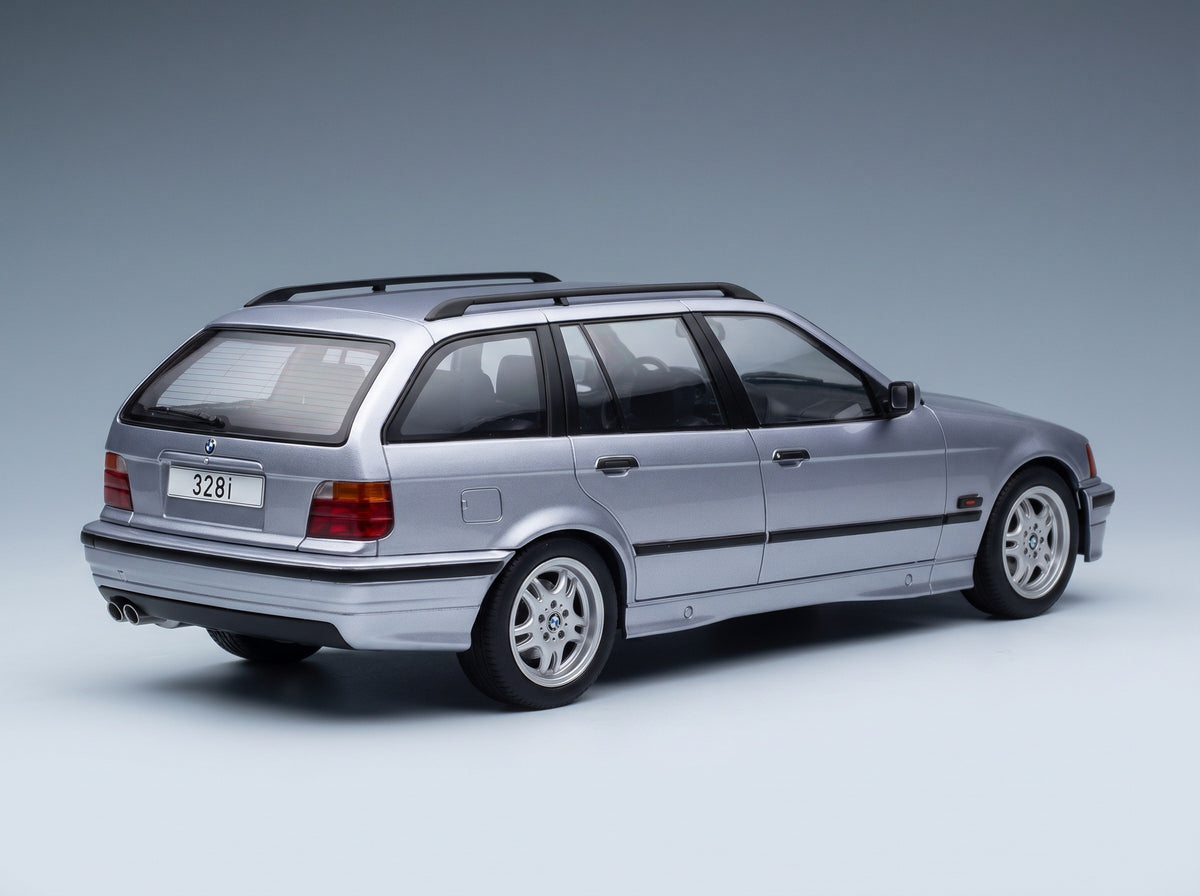 BMW 3 Series 328i Touring Station Wagon 1995 Blue Metallic MCG 1:18 scale model - rear three-quarter view