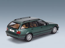 BMW 3-Series 325i Touring SW 1995 Dark Green Metallic MCG 1:18 scale model - rear three-quarter view
