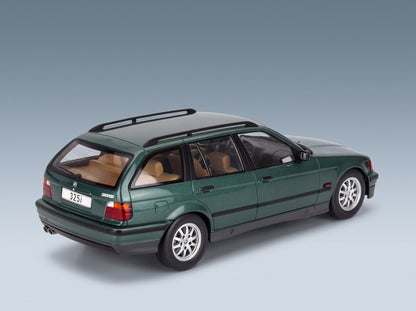 BMW 3-Series 325i Touring SW 1995 Dark Green Metallic MCG 1:18 scale model - rear three-quarter view