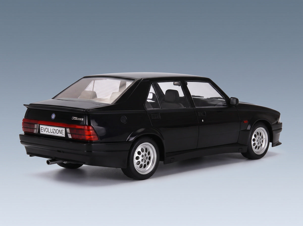 Alfa Romeo 75 Turbo Evoluzione 1987 Black MCG 1:18 scale model - rear three-quarter view
