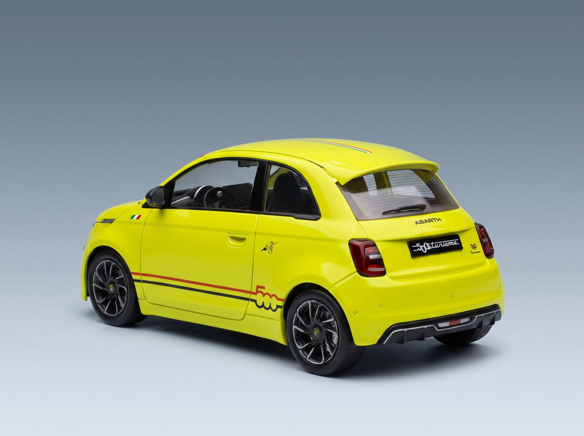 Fiat 500e Abarth 2024 Yellow MCG 1:18 scale model - rear three-quarter view