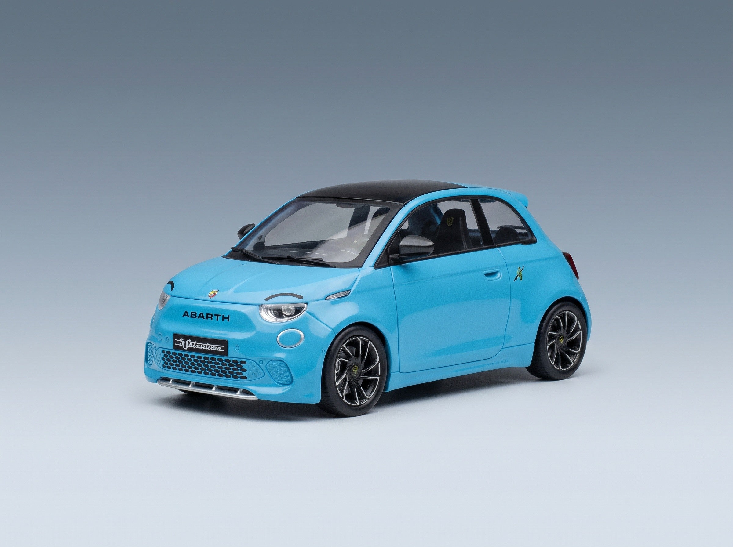 Fiat 500e Abarth 2024 Light Blue MCG 1:18 scale model - front three-quarter view
