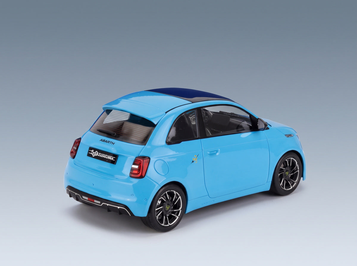 Fiat 500e Abarth 2024 Light Blue MCG 1:18 scale model - rear three-quarter view