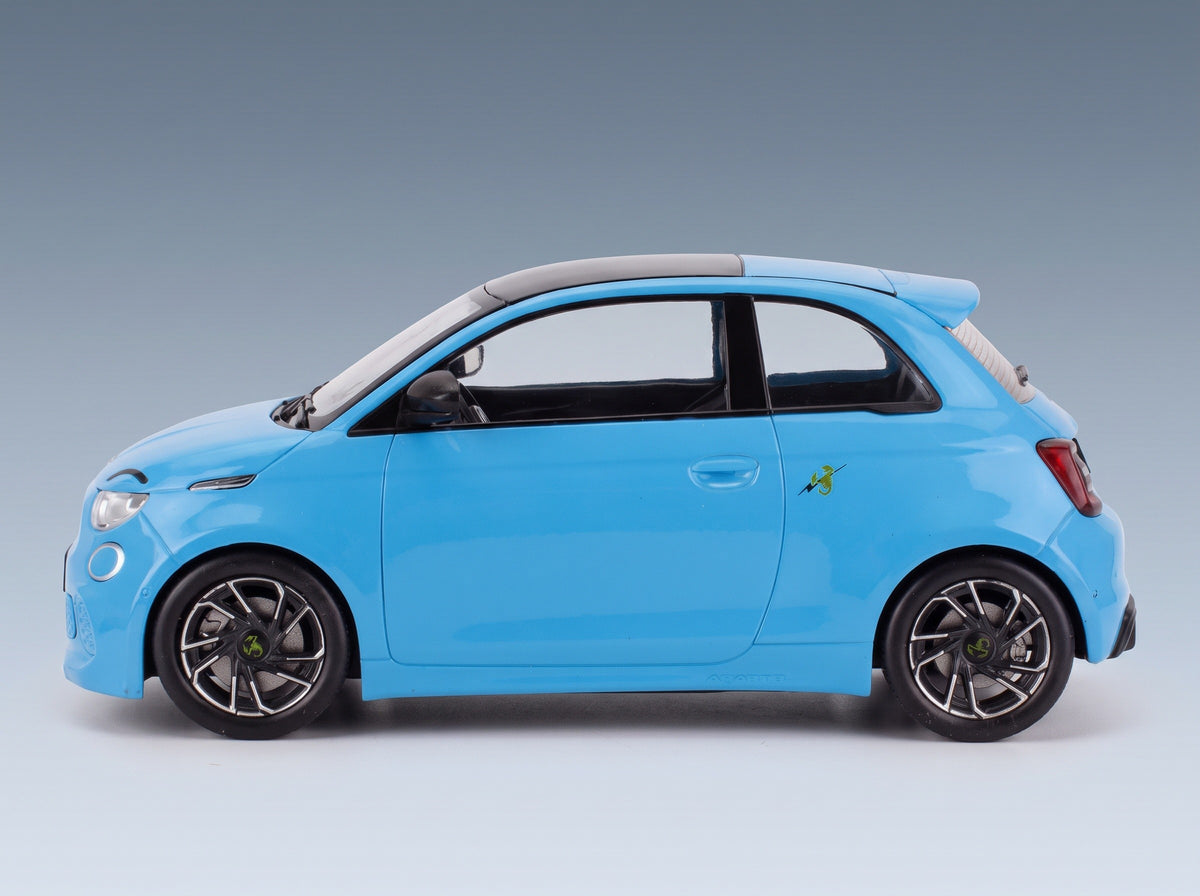 Fiat 500e Abarth 2024 Light Blue MCG 1:18 scale model - side view