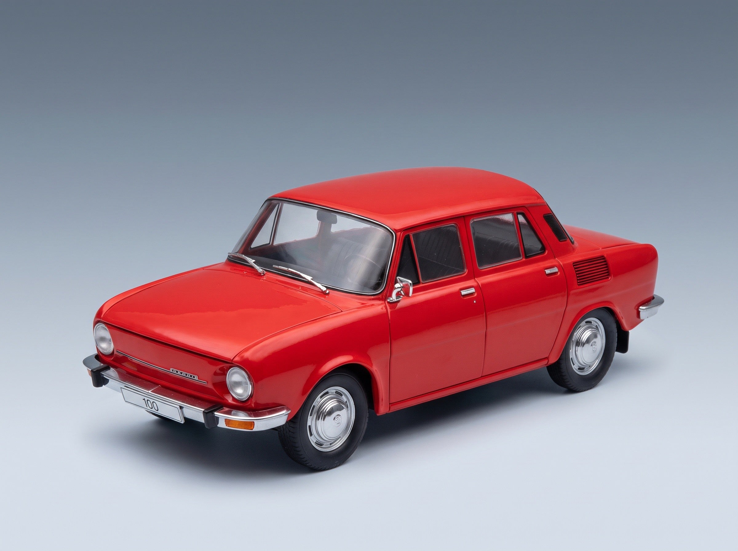 Skoda 100 L 1969 Red MCG 1:18 scale model - front three-quarter view
