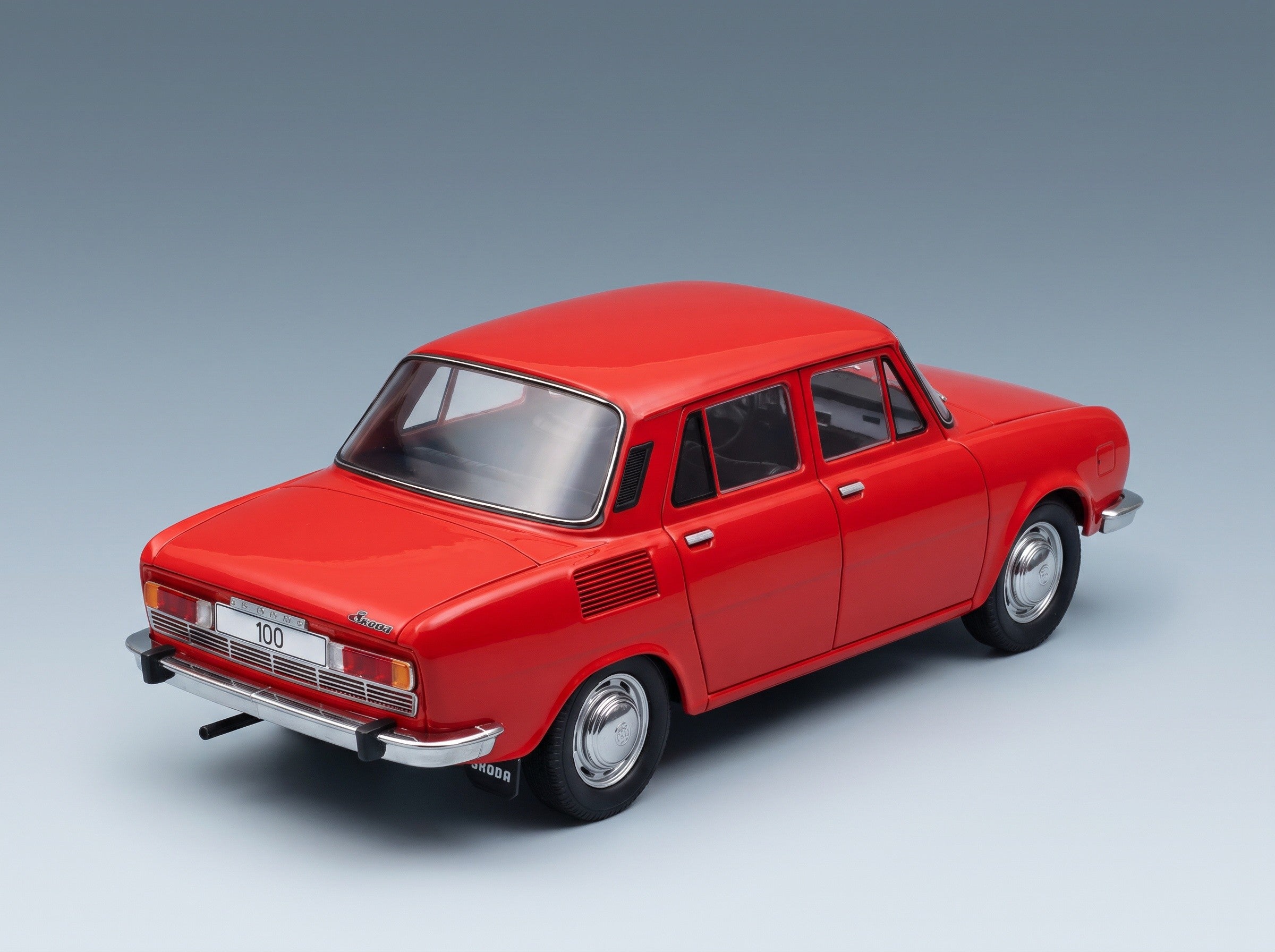 Skoda 100 L 1969 Red MCG 1:18 scale model - rear three-quarter view