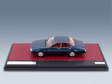 De Tomaso Deauville 2-Series 1983 Blue Metallic Matrix Scale Models 1:43 scale model - side view on display base