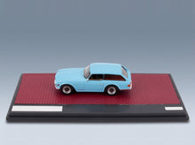 Triumph TR6 Shooting Brake Station Wagon 1974 Light Blue Matrix Scale Models 1:43 scale model - side view on display base