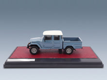 Toyota HJ45 Land Cruiser Crew Cab Pick-Up 1979 Blue Grey White Matrix Scale Models 1:43 scale model - side view on display base