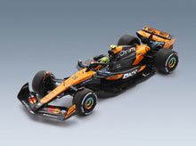 McLaren F1 MCL39 Team McLaren No. 4 Lando Norris Winner Hungarian GP World Champion with Pit Board 200 McLaren F1 GP Wins 2025 Spark Model 1:43 - front three-quarter view