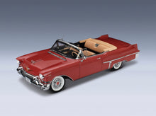 Cadillac Series 62 Convertible Open 1957 Dusty Rose Metallic Stamp Models 1:18 scale model - front three-quarter view
