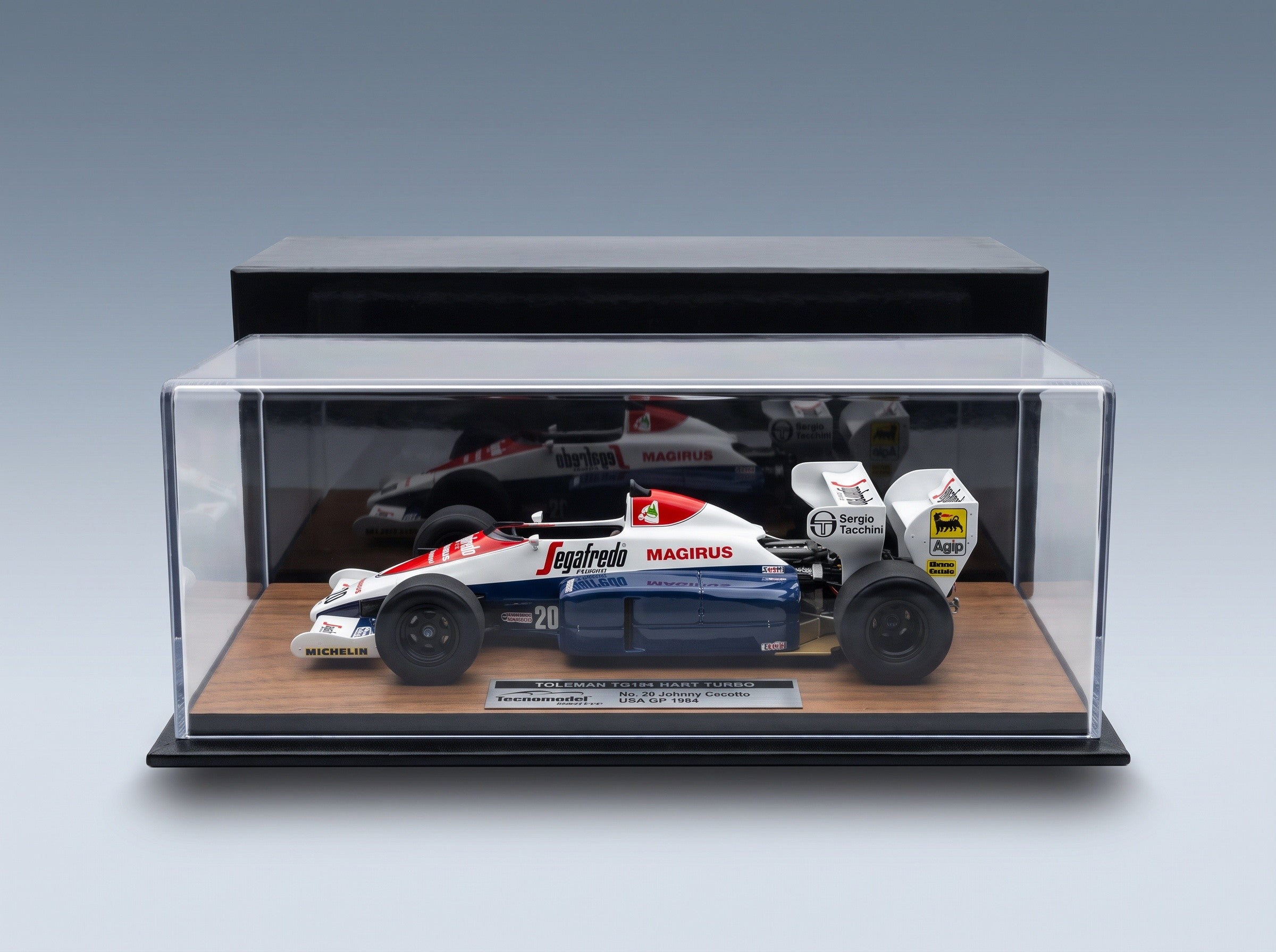 Toleman TG184 Hart Turbo Toleman Group Motorsport No. 20 Johnny Cecotto USA GP 1984 Tecnomodel 1:18 scale model - side view in display case