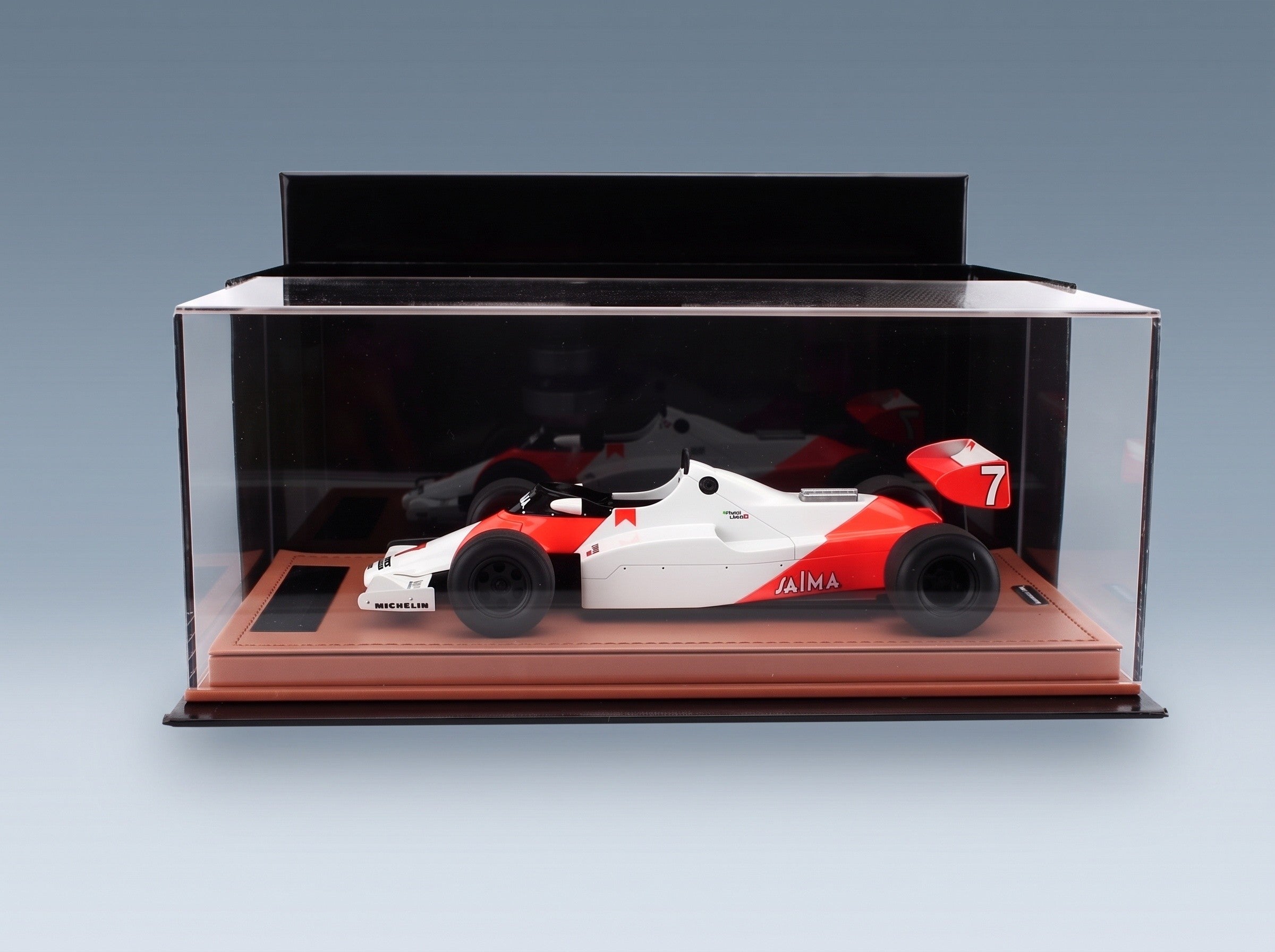McLaren F1 MP4/1C No. 7 Ayrton Senna Silverstone Test Drive 1983 Tecnomodel 1:18 scale model - side view in display case