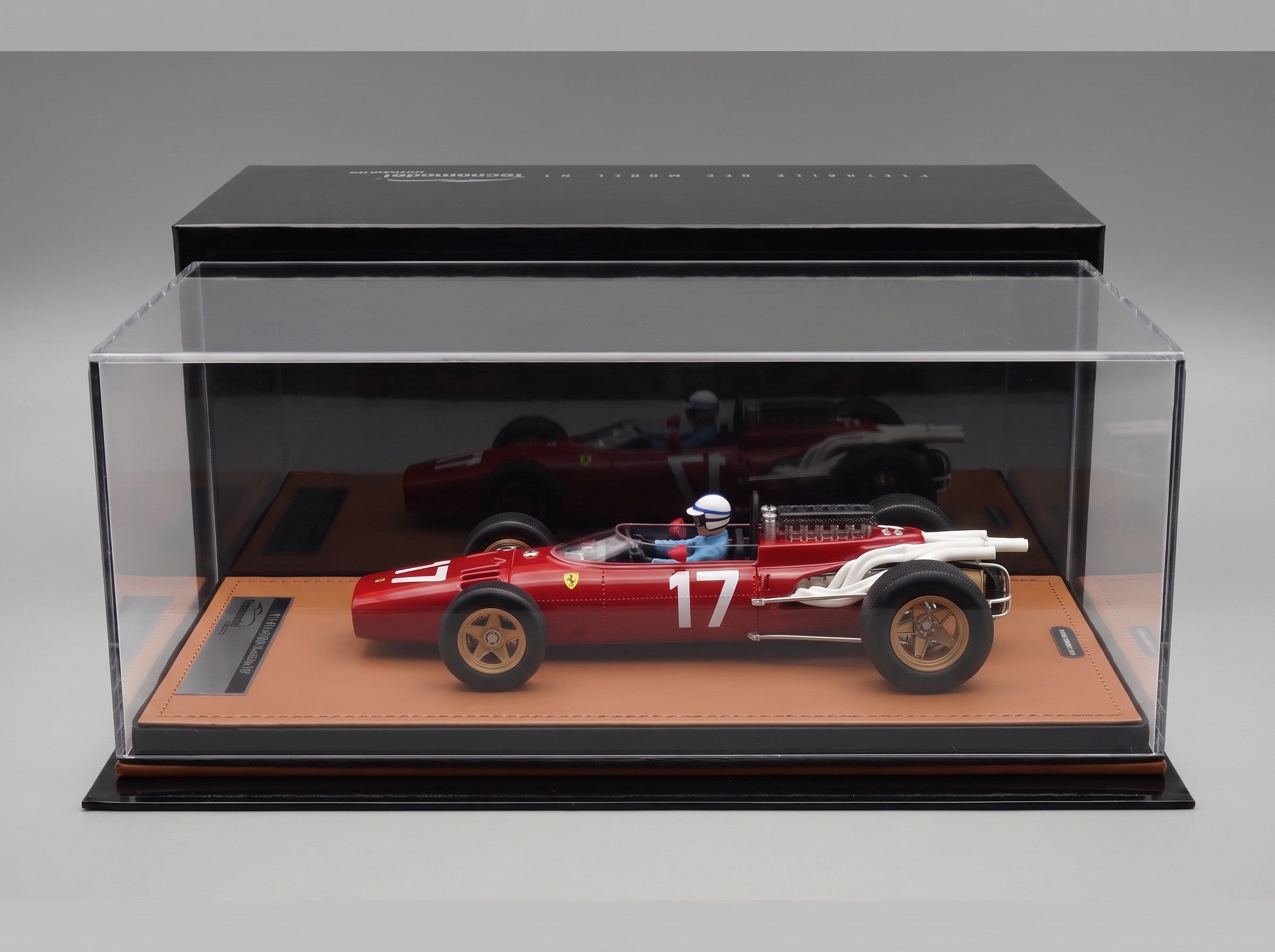 Ferrari 312 F1 No. 17 John Surtees Monaco GP 1966 with Driver Figure Tecnomodel 1:18 scale model - side view in display case