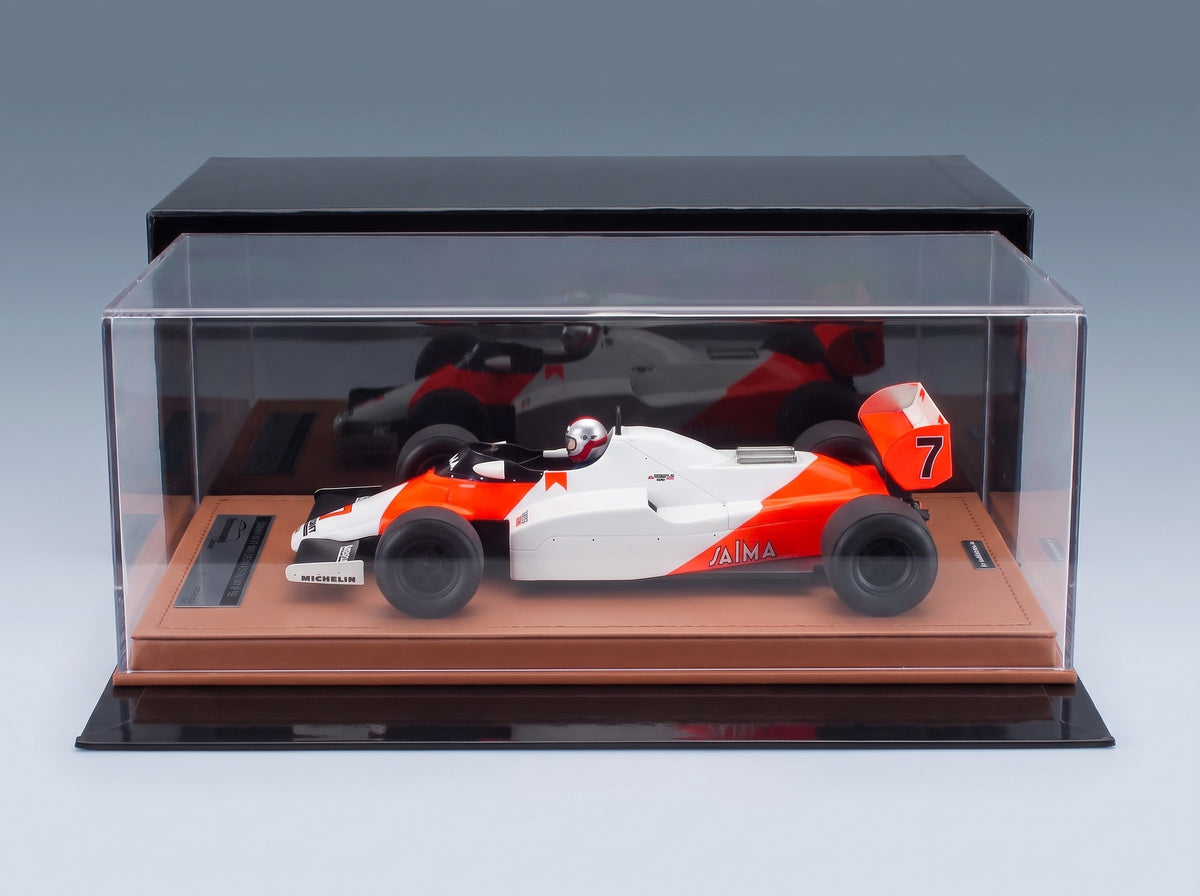 McLaren F1 MP4/1C No. 7 John Watson Winner USA Long Beach GP 1983 with Driver Tecnomodel 1:18 scale model - side view in display case