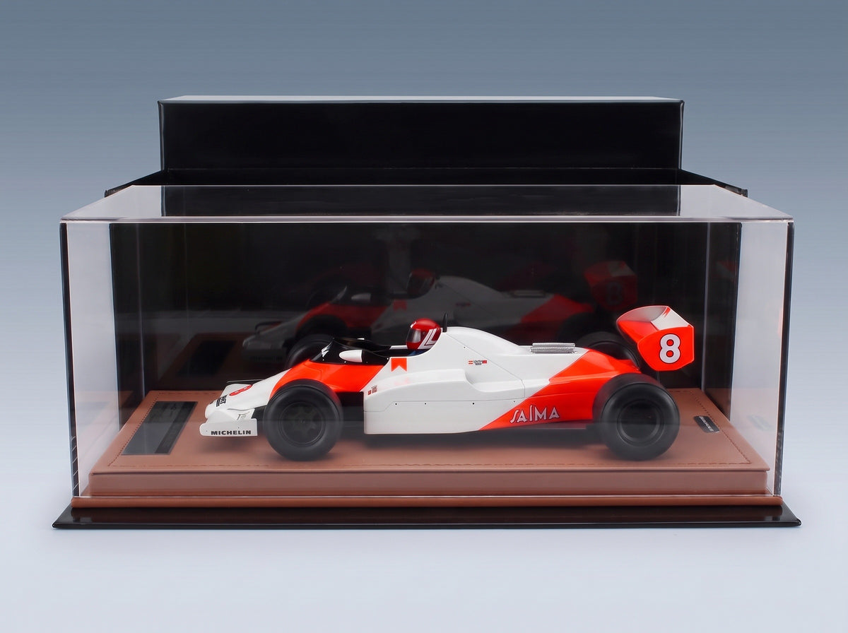 McLaren F1 MP4/1C No. 8 Niki Lauda Monaco GP 1983 with Rain Tyres with Driver Tecnomodel 1:18 scale model - side view in display case