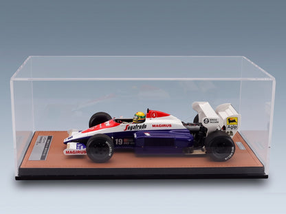 Toleman TG184 Hart No. 19 Ayrton Senna British GP 3rd 1984 with Driver Tecnomodel 1:18 scale model - side view in display case