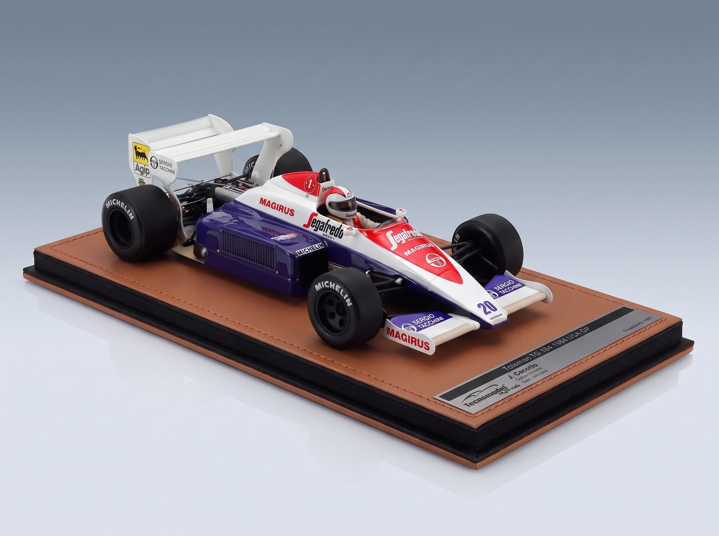 Toleman TG184 Hart Turbo Toleman Group Motorsport No. 20 Johnny Cecotto Dallas GP 1984 with Driver Tecnomodel 1:18 scale model - side view on display base