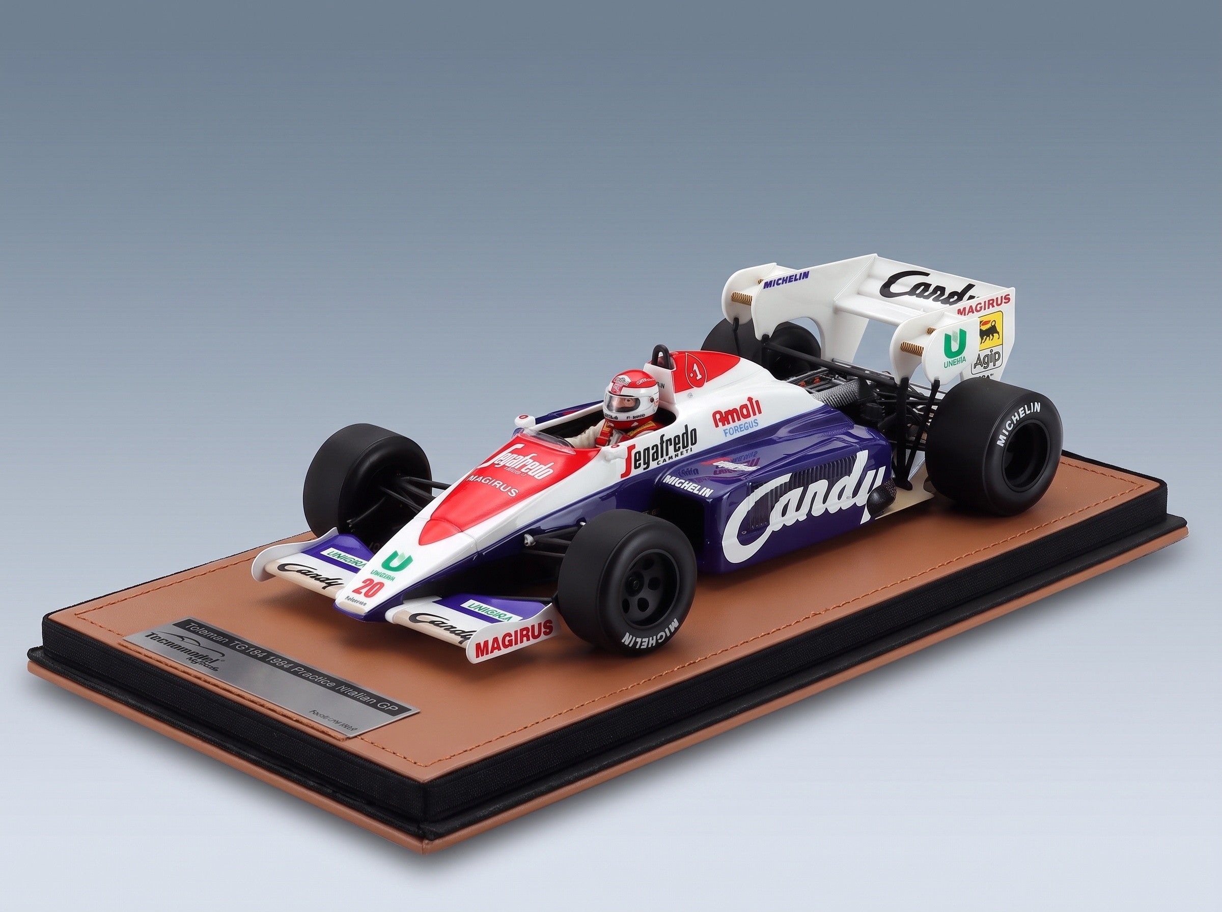 Toleman TG184 Hart No. 20 Pierluigi Martini Practice Italian GP 1984 with Driver Tecnomodel 1:18 scale model - side view on display base