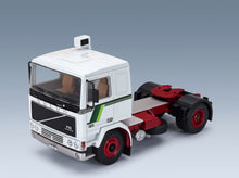 Volvo F10 Tractor Truck 2-Axle 1983 White Green Red IXO Models 1:43 scale model - front three-quarter view