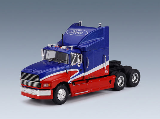 Ford Aeromax Tractor Truck 3-Axle 1990 Blue Red IXO Models 1:64 scale model - front three-quarter view