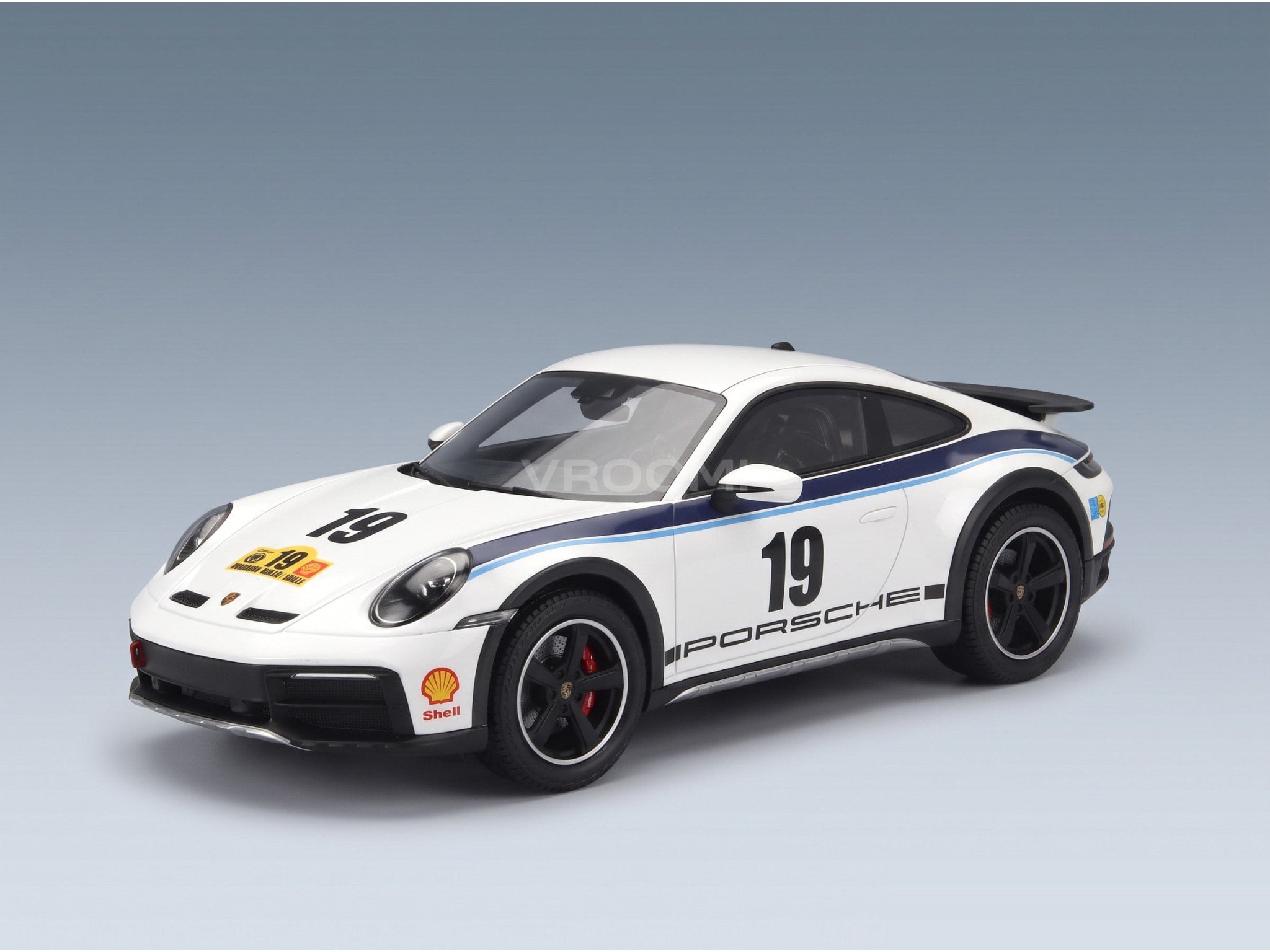 Porsche 911 992 Coupe No. 19 Rally Dakar Design 2022 with Showcase Spark Model 1:18 scale model - front three-quarter view