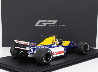 WILLIAMS - F1 FW14B RENAULT N° 5 : CHAMPION DU MONDE, POLE POSITION, MEILLEUR TOUR ET VAINQUEUR DU GP DE GRANDE-BRETAGNE (avec figurine du pilote) 1992 NIGEL MANSELL - BLEU, JAUNE, BLANC Maquette de voiture à l'échelle sur Vroomi