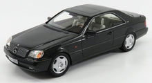 Coupé Mercedes-Benz negro, modelo a escala 1/18, interior detallado, ya disponible para coleccionistas.