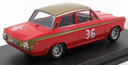 Red and gold vintage race car model with number 36, displayed on a black stand, sold on Vroomi