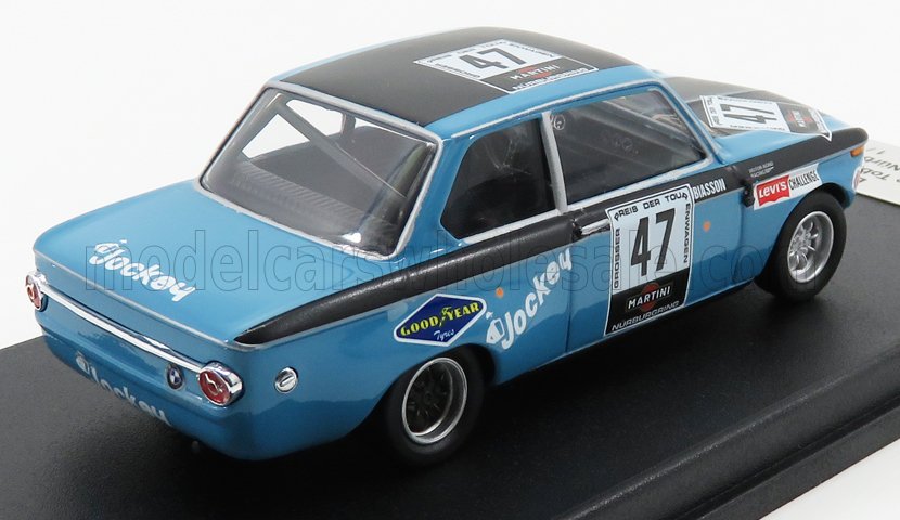 Coche de carreras a escala azul y negro con el número 47, pieza de coleccionista disponible ahora en línea.