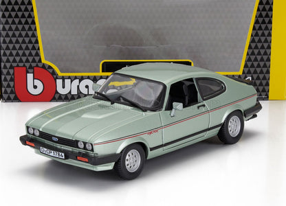 Maqueta del modelo Green Ford Capri Injection con detalles realistas, presentada en un embalaje con la marca, disponible en Vroomi.