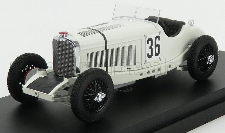 Coche de carreras vintage blanco, modelo número 36, con ruedas negras y soporte de exposición, disponible en Vroomi.