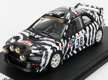 Maqueta a escala 1/18 de un coche de rally Subaru con rayas de cebra y el número 38, actualmente disponible en línea.
