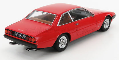 Coche clásico Ferrari 365 GT4 2+2 rojo con llantas cromadas, presentado en Vroomi.