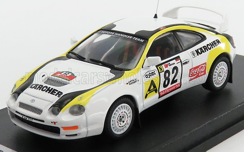 White and yellow Toyota rally car model with number 82, Karcher and Coca-Cola decals, available on Vroomi