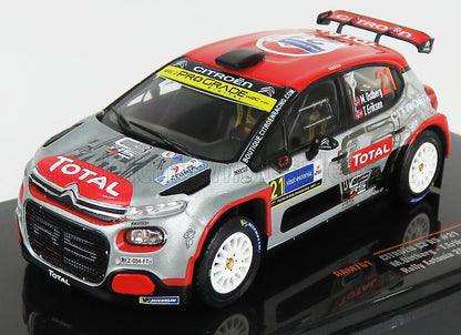 Modelo detallado de coche de rally Citroën con la marca Total, llantas blancas y adhesivos de carreras, disponible en Vroomi.
