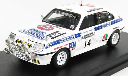 White Team PR Reilly rally car model with STP and Interpart decals, extra front lights, shown on display platform, offered on Vroomi
