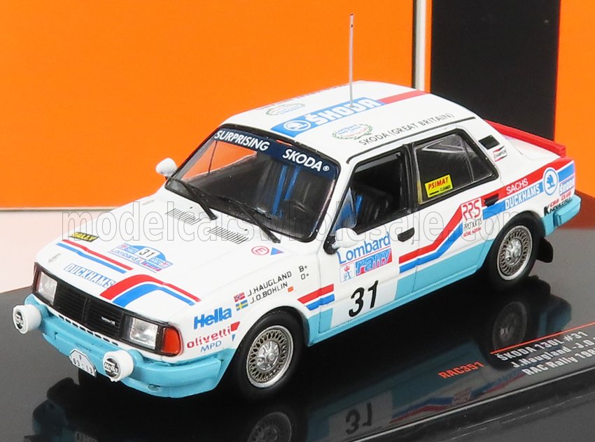 Model of white and blue Skoda 130L rally car with number 31, detailed decals, and sponsors, listed on Vroomi