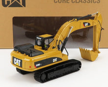 Modelo de excavadora Caterpillar 330D L amarilla con orugas negras, disponible en Vroomi.