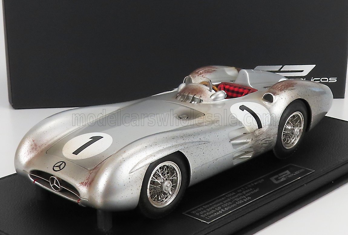 Silver Mercedes-Benz 300 SLR racing model car with number 1, weathered finish, displayed on black base, available on Vroomi