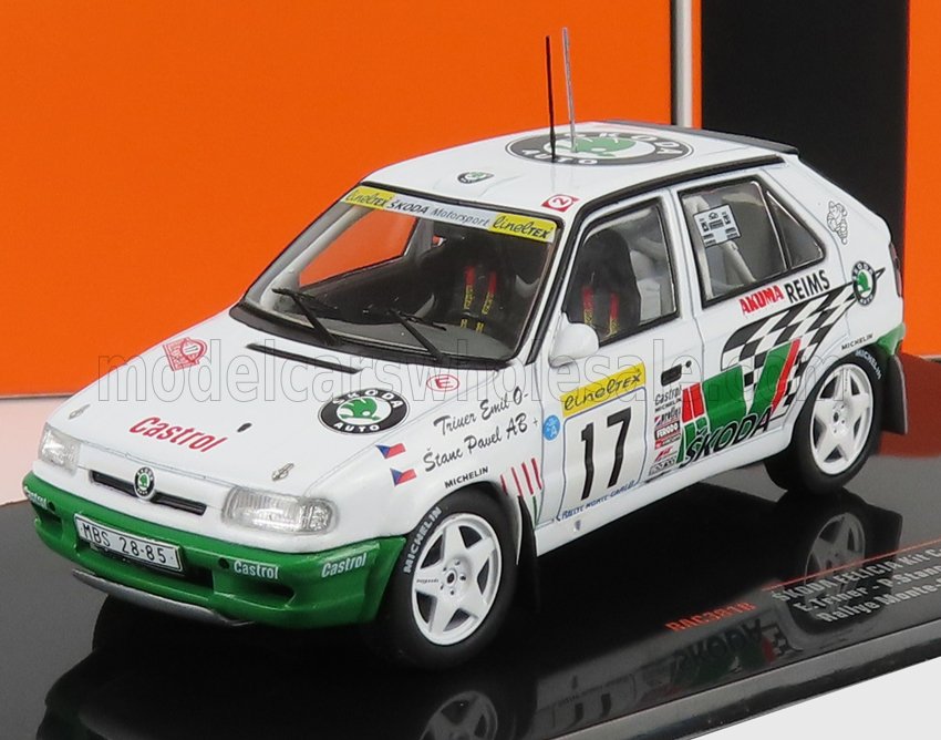 White Škoda Felicia rally car model with green accents and racing decals, available on Vroomi