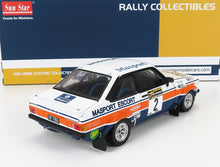 Maqueta de coche de rally Masport Escort a escala 1/18 con decoración de competición, disponible en Vroomi.