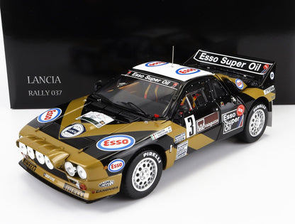 Modelo de coche de rally Lancia Rally 037 con la marca Esso Super Oil, neumáticos Pirelli, disponible en Vroomi.