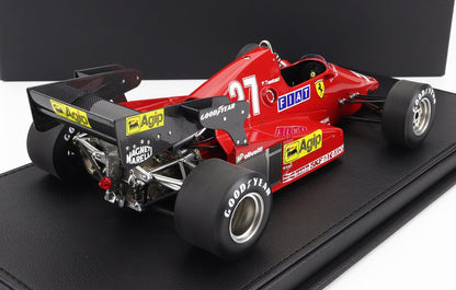 Red vintage Ferrari F1 race car model with sponsor logos displayed on black base, now offered on Vroomi