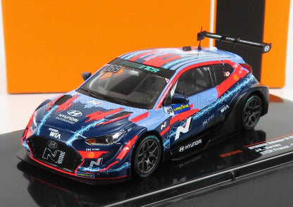 Hyundai Motorsport racing model car with blue, red, and black livery on display, offered through Vroomi