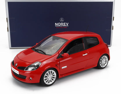 Red Renault Sport model car with detailed wheels in front of blue Norev Collectors box, available on Vroomi