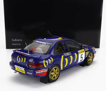 SUBARU - IMPREZA 555 REPSOL N 5 GANADOR RALLY MONTECARLO 1995 C.SAINZ - L.MOYA - AZUL AMARILLO